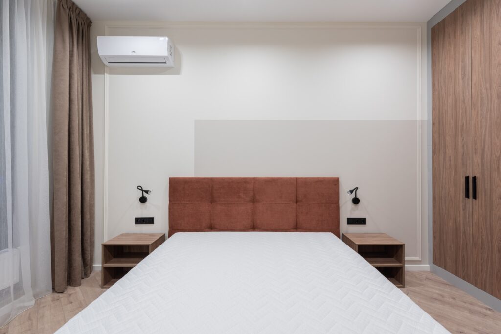 a bedroom with air con