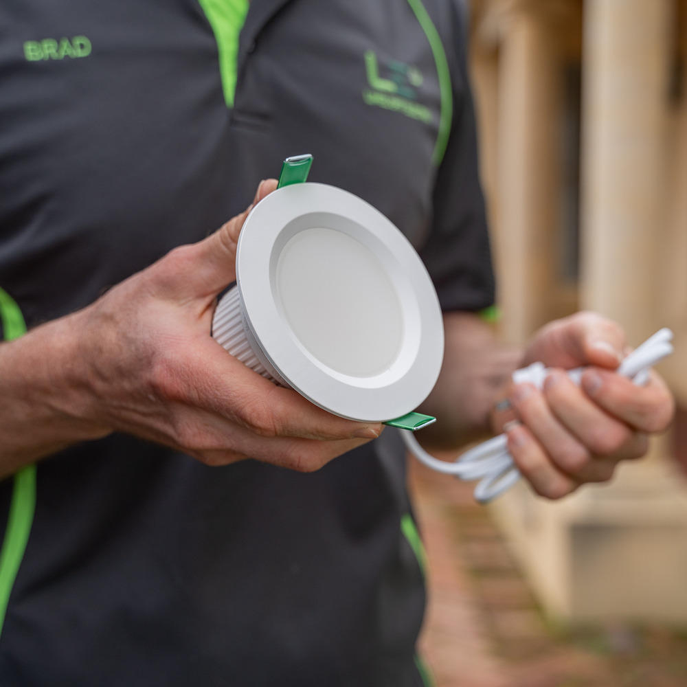 Limelight Electrix team member installing LED downlight in a Perth home